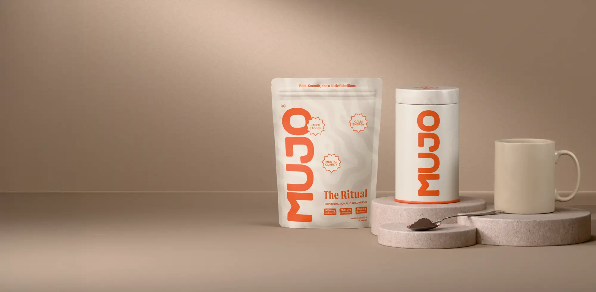 White and orange mujo ’the ritual’ tea bag pouch with a resealable zipper top, standing next to its matching cylindrical container.