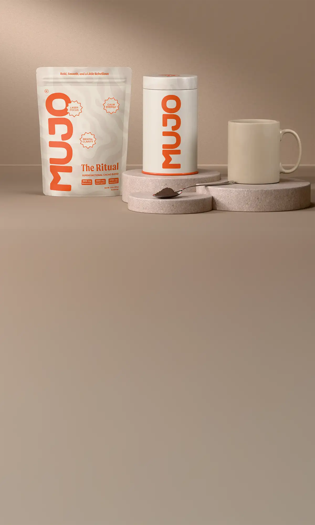 White and orange mujo ’the ritual’ tea packaging with a resealable pouch design.